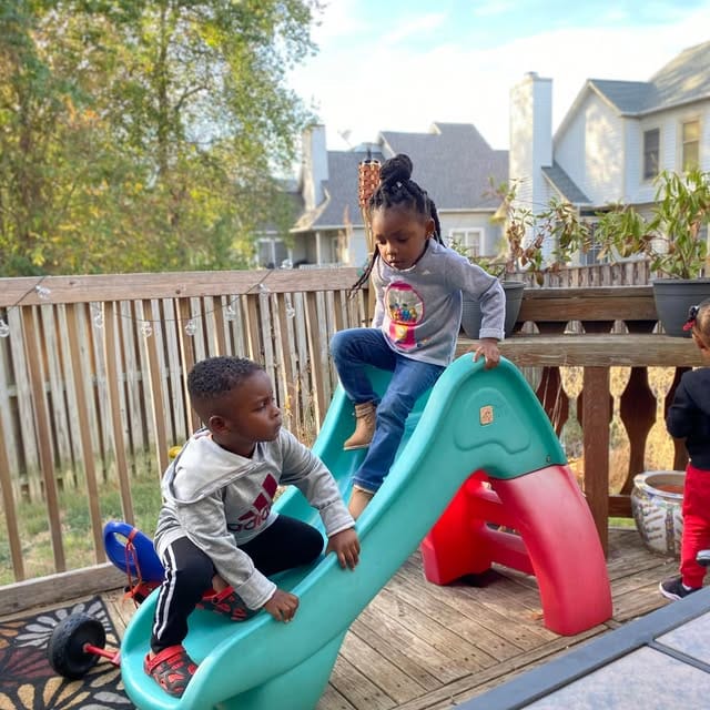 School-age children playing outside at Lisa's Rascals Daycare after school care